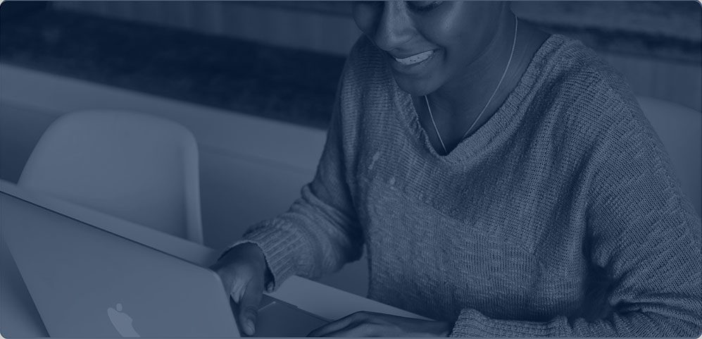 a woman working on a laptop
